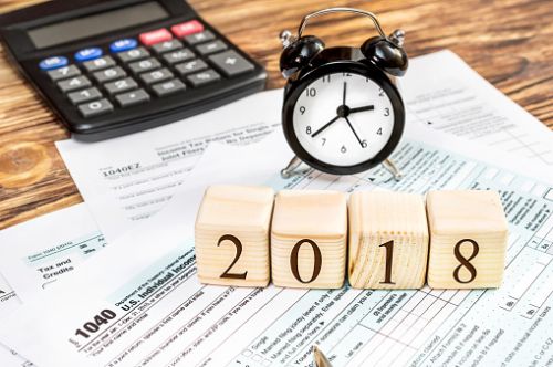 Clock and Calculator - 2018 taxes and alimony - Ashley Wood Law, P.C.