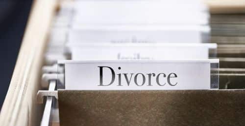 Divorce Files and folders in desk drawer. Visual concept for a legal blog discussing in a divorce which Utah Divorce papers are essential for fair property division.