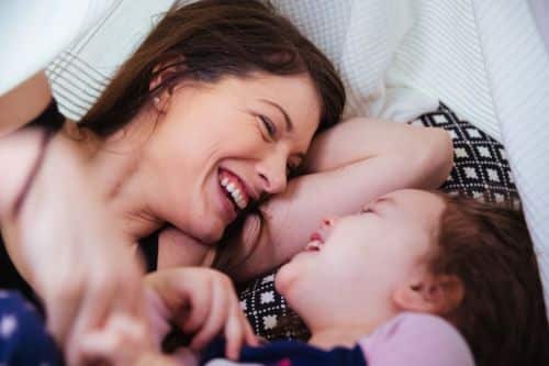 Mother and daughter talking to each other. Visual concept for a family law blog discussing when and how to request a child support modification in Utah, including criteria, legal processes, and alternative dispute options.