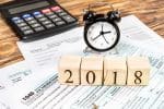 Clock and Calculator - 2018 taxes and alimony - Ashley Wood Law, P.C.